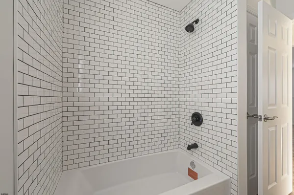 a bathroom with a bathtub