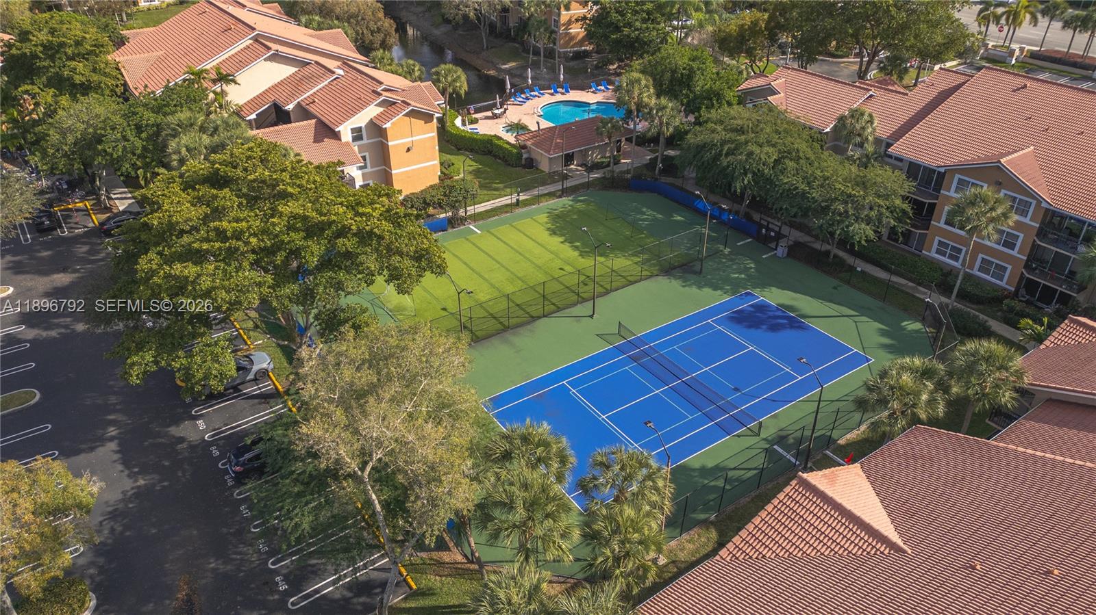 9033 Wiles Road, Unit 303 Coral Springs, FL 33067 - Photo 15 of 17 an aerial view of a house