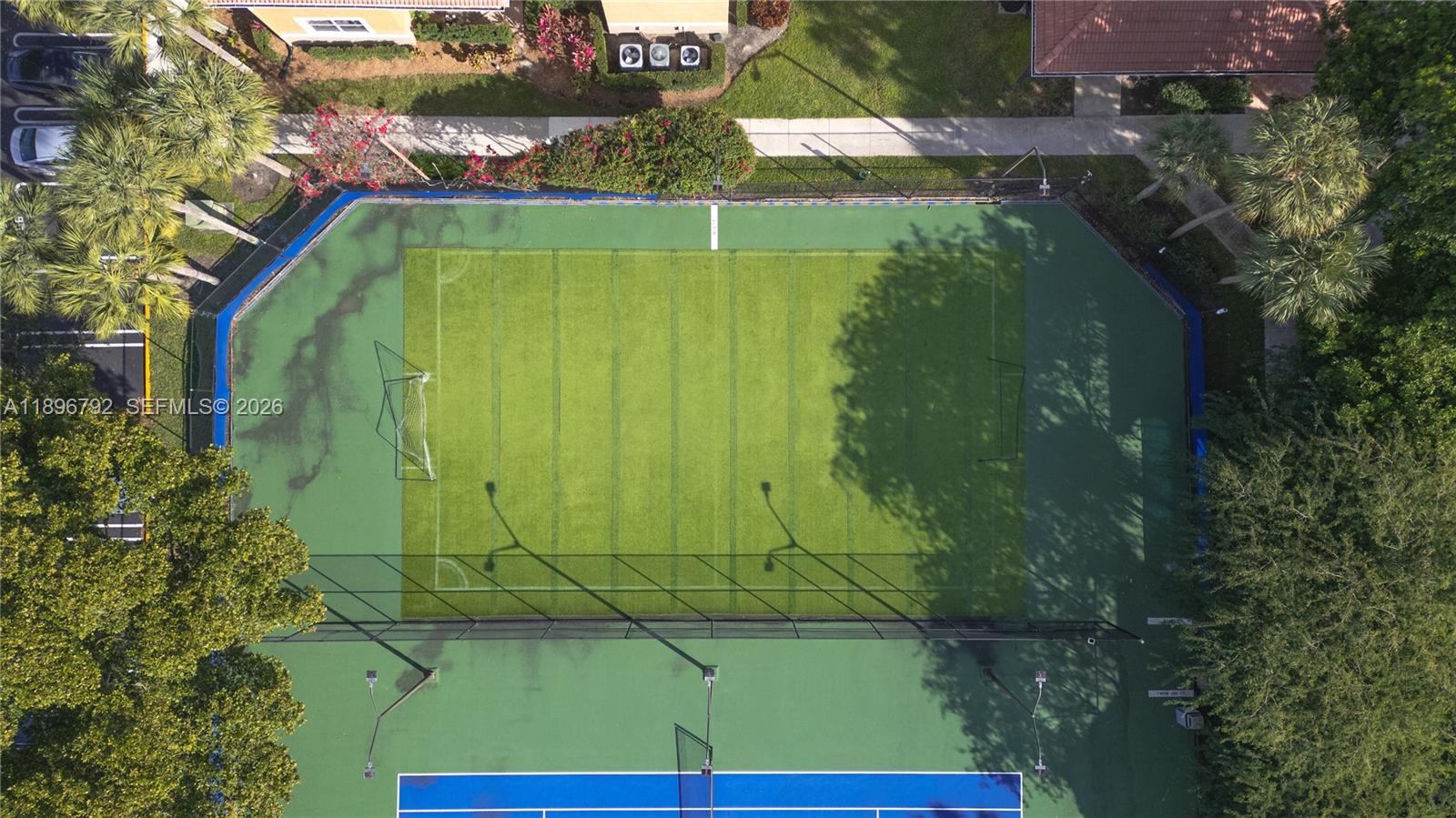 9033 Wiles Road, Unit 303 Coral Springs, FL 33067 - Photo 17 of 17 a view of a garden