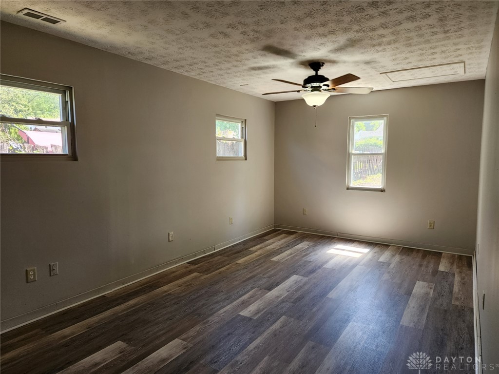 211 Race Street Spring Valley, OH 45370 - Photo 4 of 12 Bright and airy room with durable flooring, ready for your personal touch.