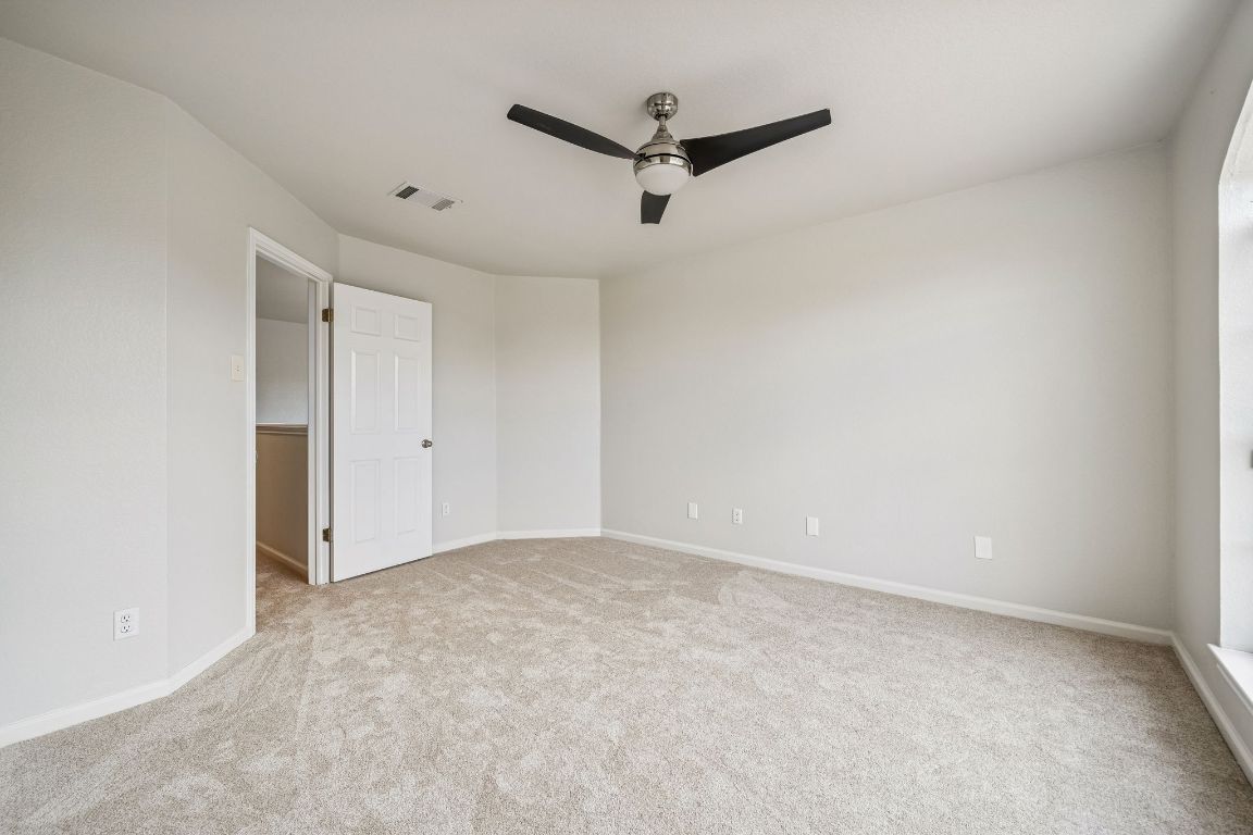 8611 Devine Lane Austin, TX 78748 - Photo 15 of 33 a view of a big room with carpet