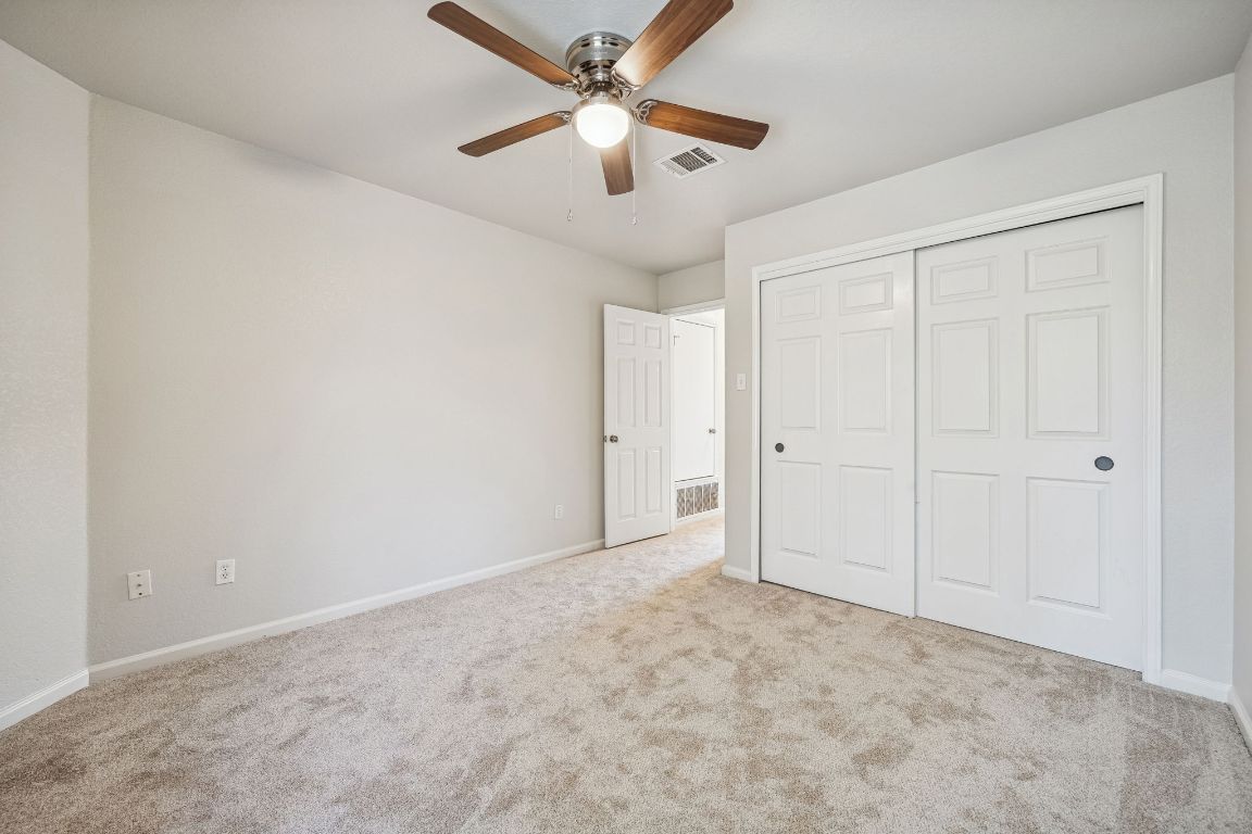 8611 Devine Lane Austin, TX 78748 - Photo 21 of 33 wooden floor in an empty room