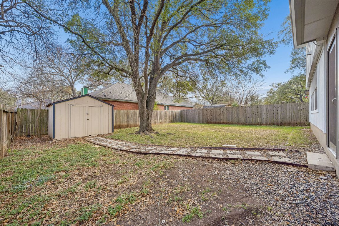 8611 Devine Lane Austin, TX 78748 - Photo 30 of 33 a view of a house with a back yard