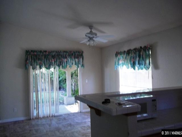 391 B Bens Way Fernley, NV 89408 - Photo 4 of 10 a room that has a window and furniture