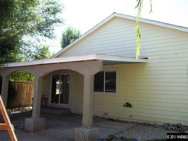 391 B Bens Way Fernley, NV 89408 - Photo 7 of 10 a view of a house with backyard and garden