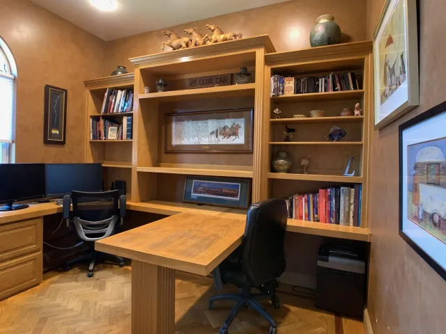 a kitchen with a table and chairs