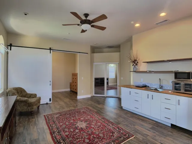 a view of yard with patio