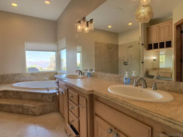 a view of house with outdoor space and trees