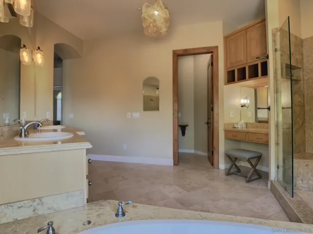 a living room with a couch and a rug