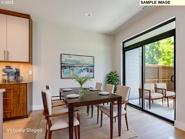 a view of a dining room with furniture window and outside view
