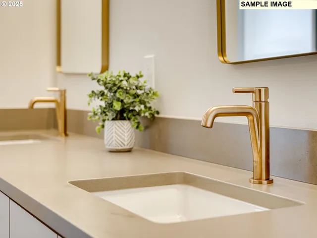 a bathroom with a tub and sink