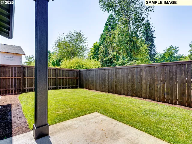 a view of a backyard with a backyard