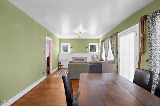 a kitchen with stainless steel appliances granite countertop a stove and a refrigerator