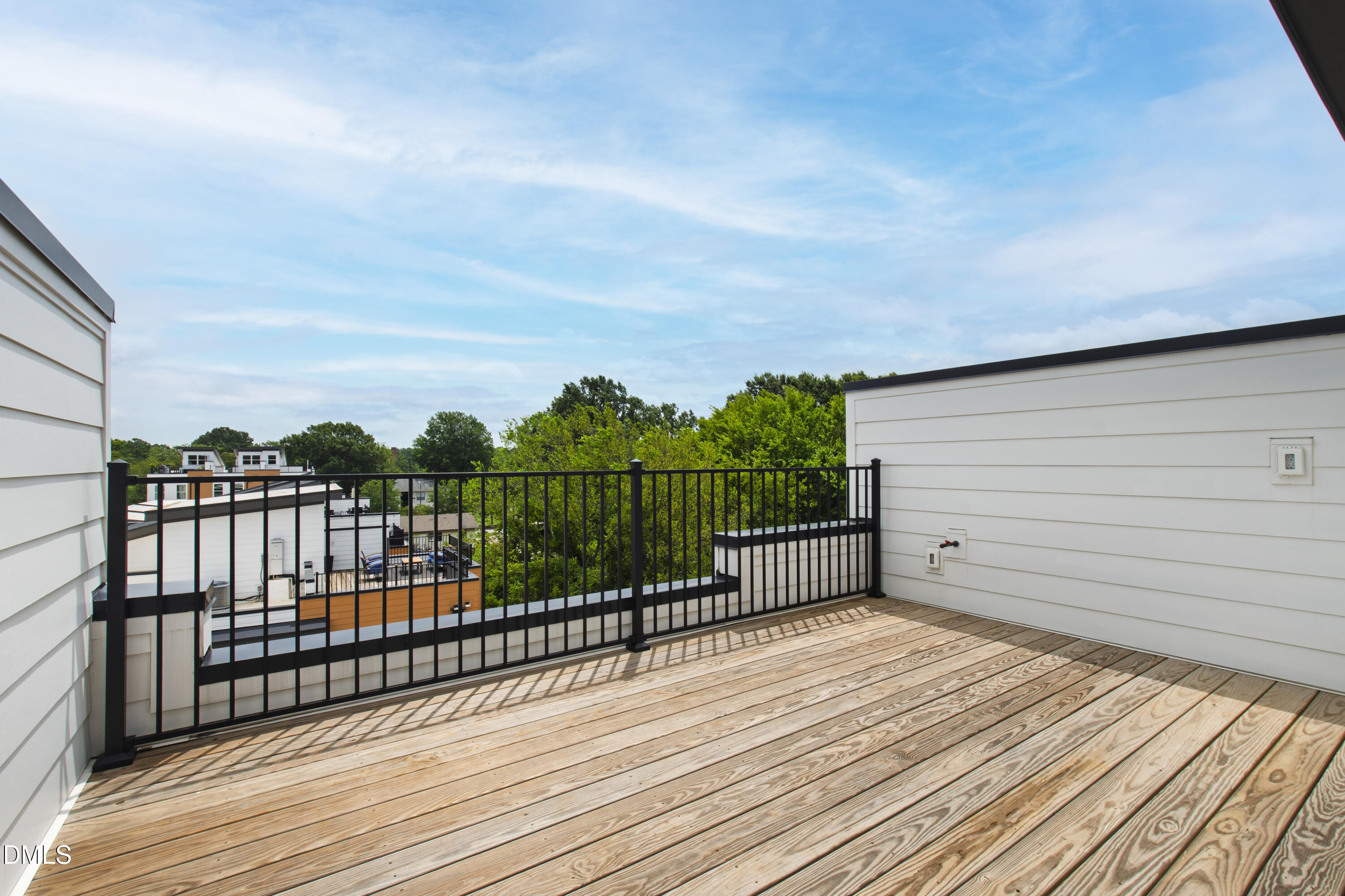 1317 Garner Road, Unit 102 Raleigh, NC 27610 - Photo 7 of 44 a view of a terrace with sky view