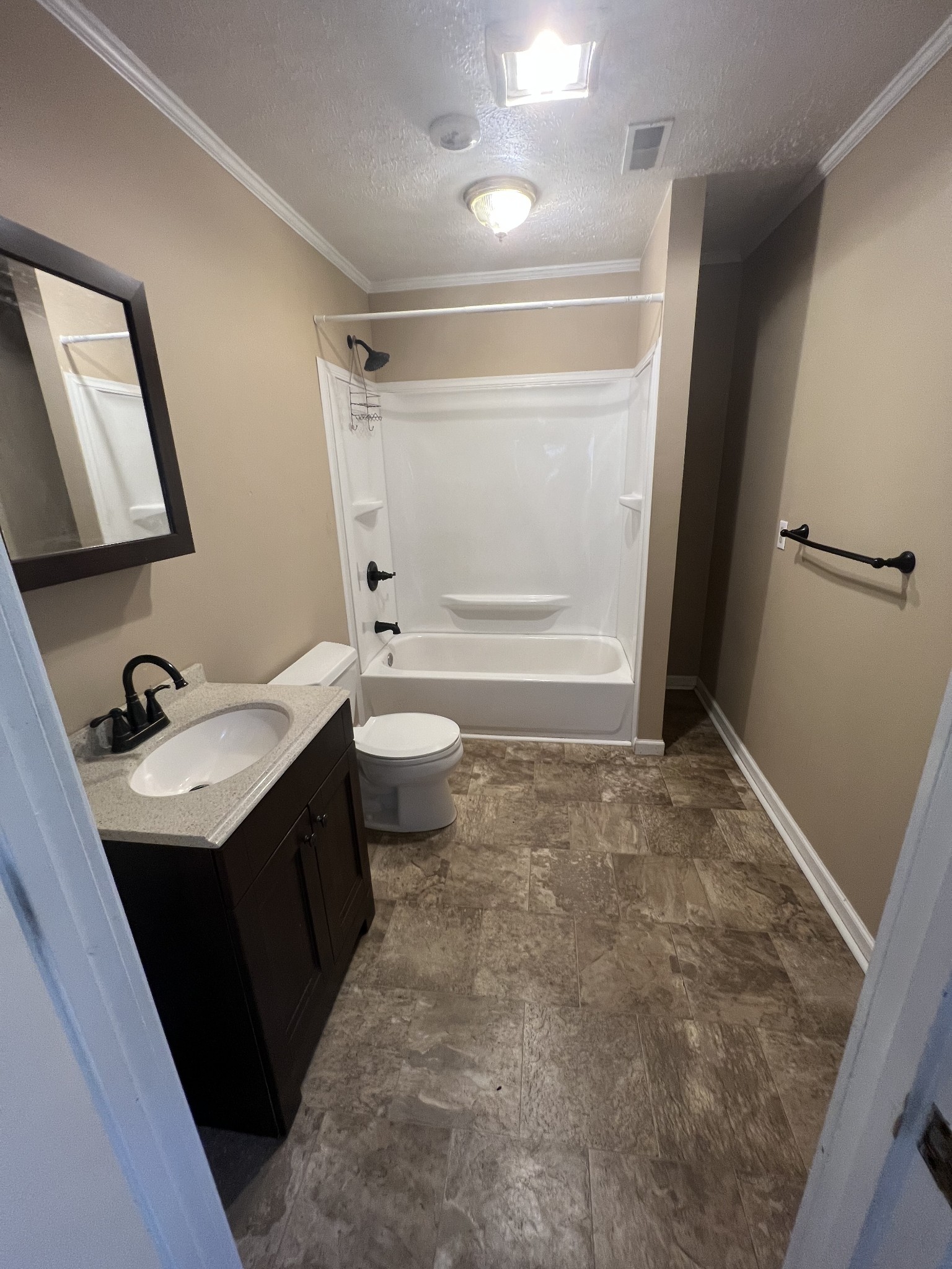 5588 Lebanon Road Lebanon, TN 37087 - Photo 29 of 43 a bathroom with a sink vanity granite toilet tub and shower