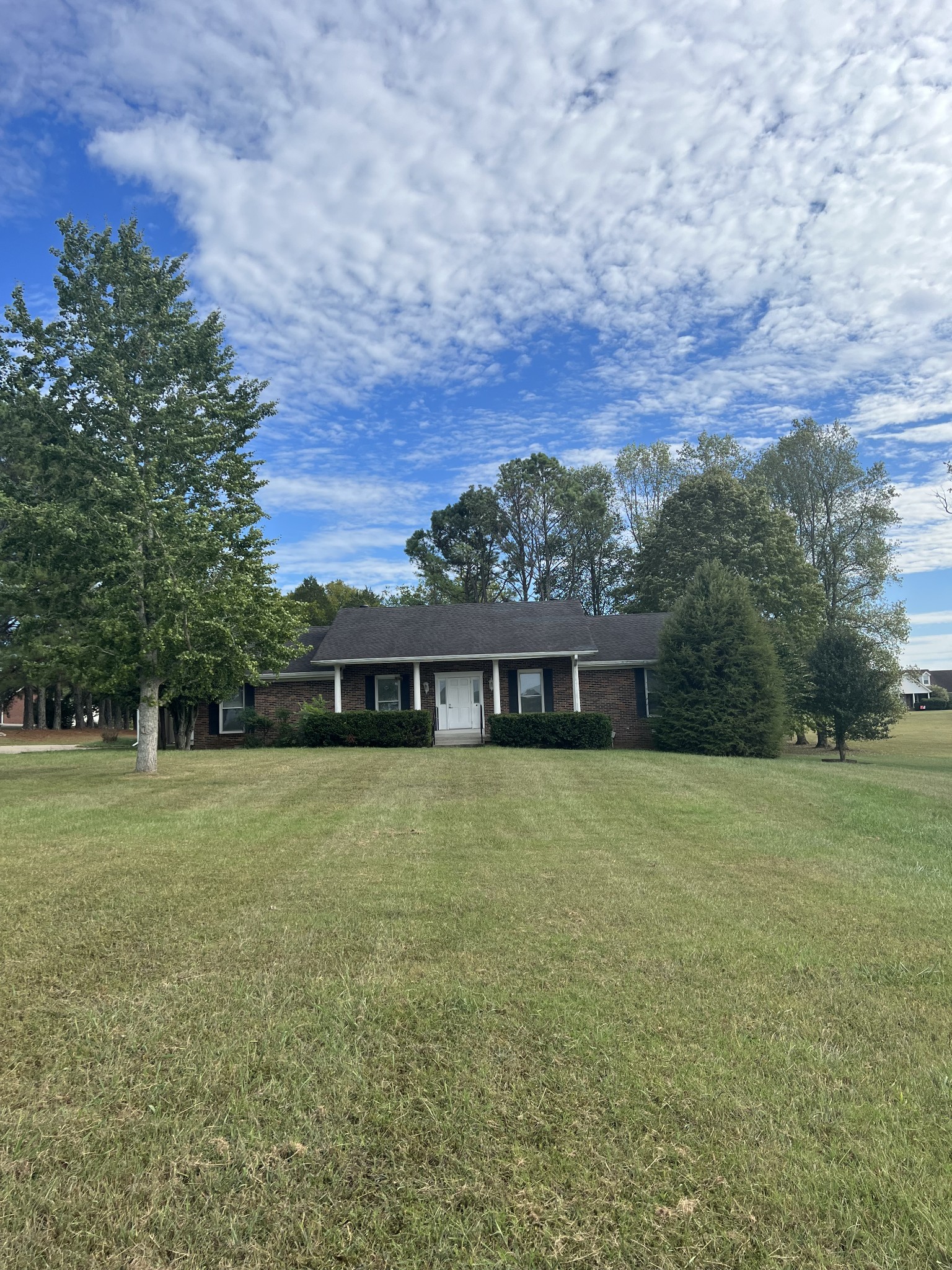 5588 Lebanon Road Lebanon, TN 37087 - Photo 3 of 43 a front view of house with yard and trees