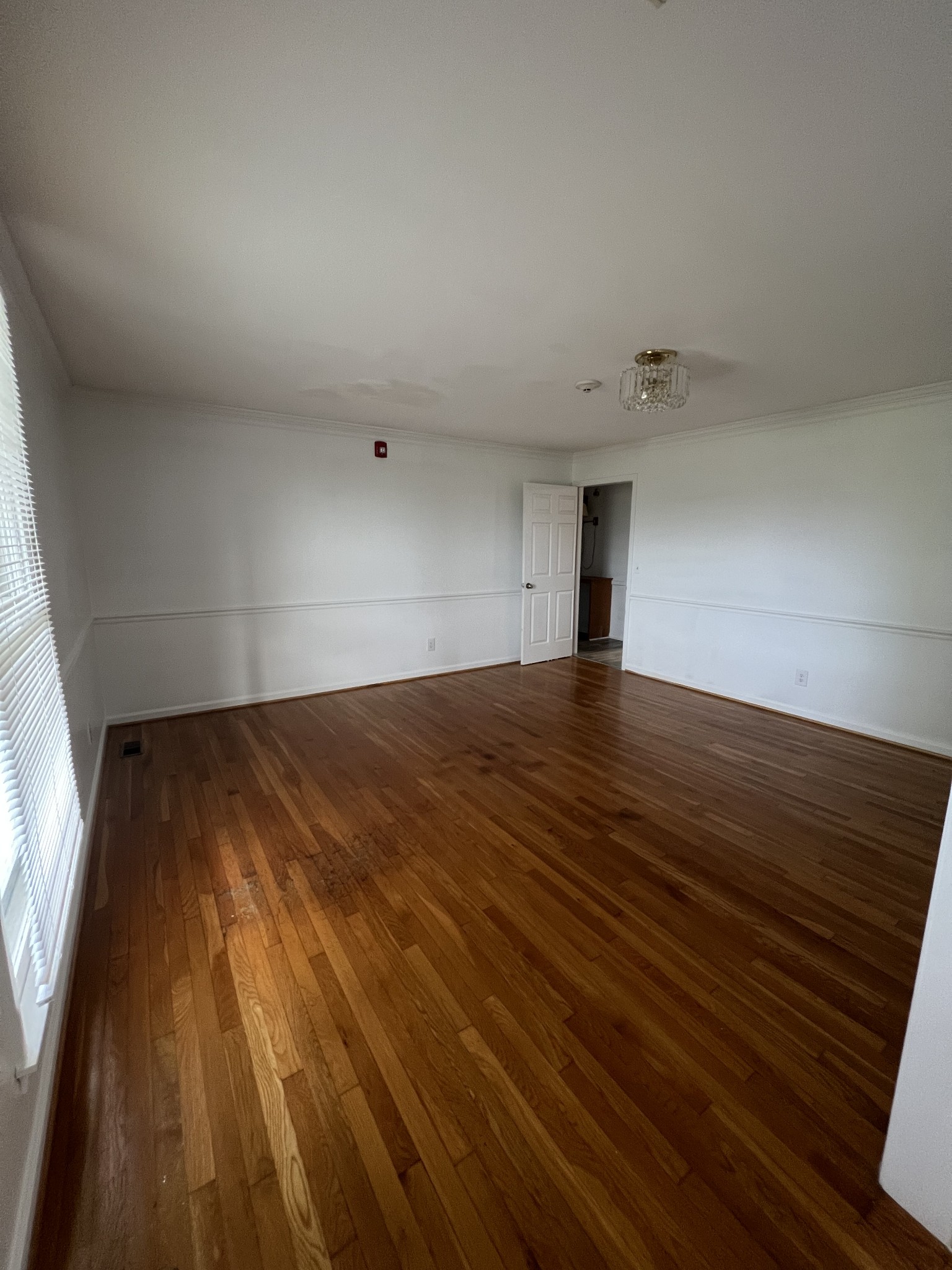 5588 Lebanon Road Lebanon, TN 37087 - Photo 6 of 43 a view of an empty room with wooden floor