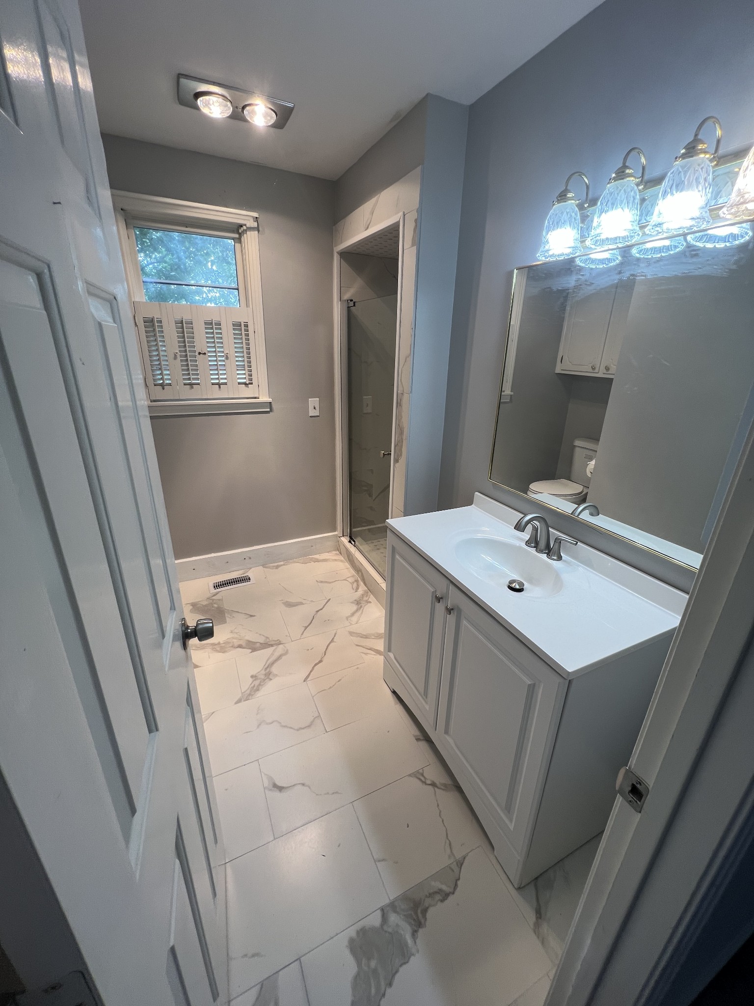 5588 Lebanon Road Lebanon, TN 37087 - Photo 7 of 43 a bathroom with a sink vanity and mirror