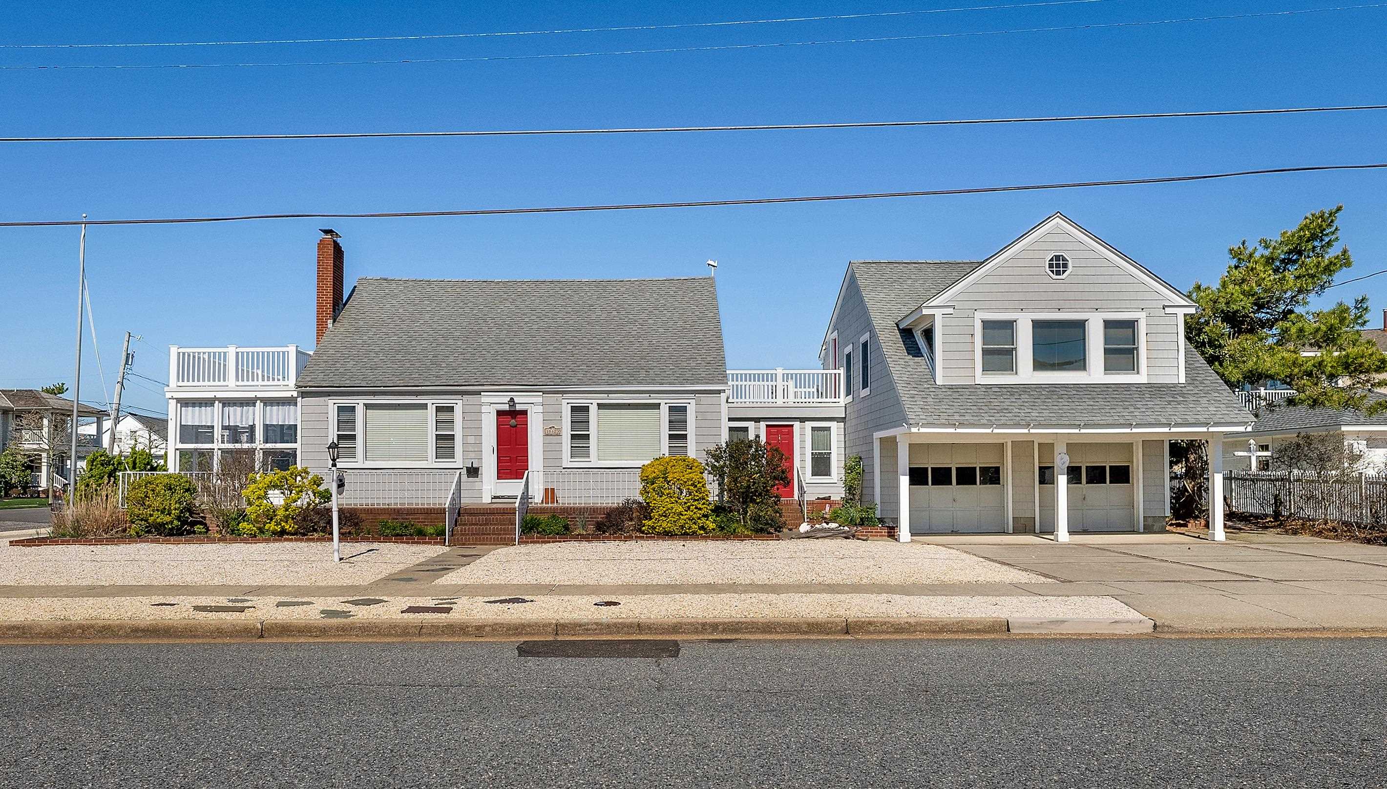 10823 1st Stone Harbor, NJ 08247 - Photo 1 of 8 a front view of a house with a yard