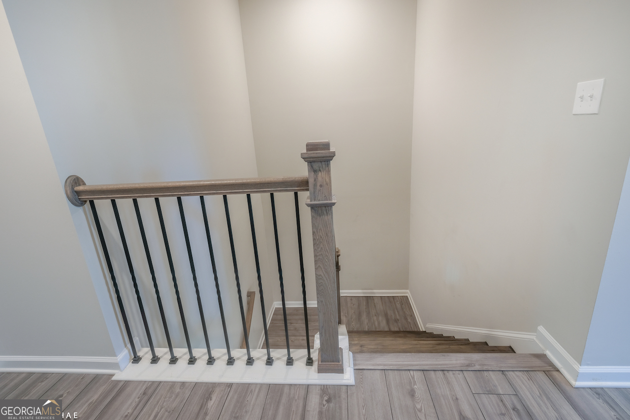 2247 Pink Hawthorn Drive Buford, GA 30518 - Photo 12 of 43 a view of a porch with wooden floor