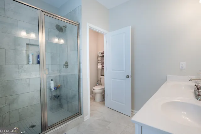 a bathroom with a bathtub and a sink