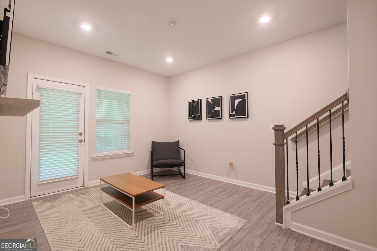 2247 Pink Hawthorn Drive Buford, GA 30518 - Photo 35 of 43 a living room with furniture