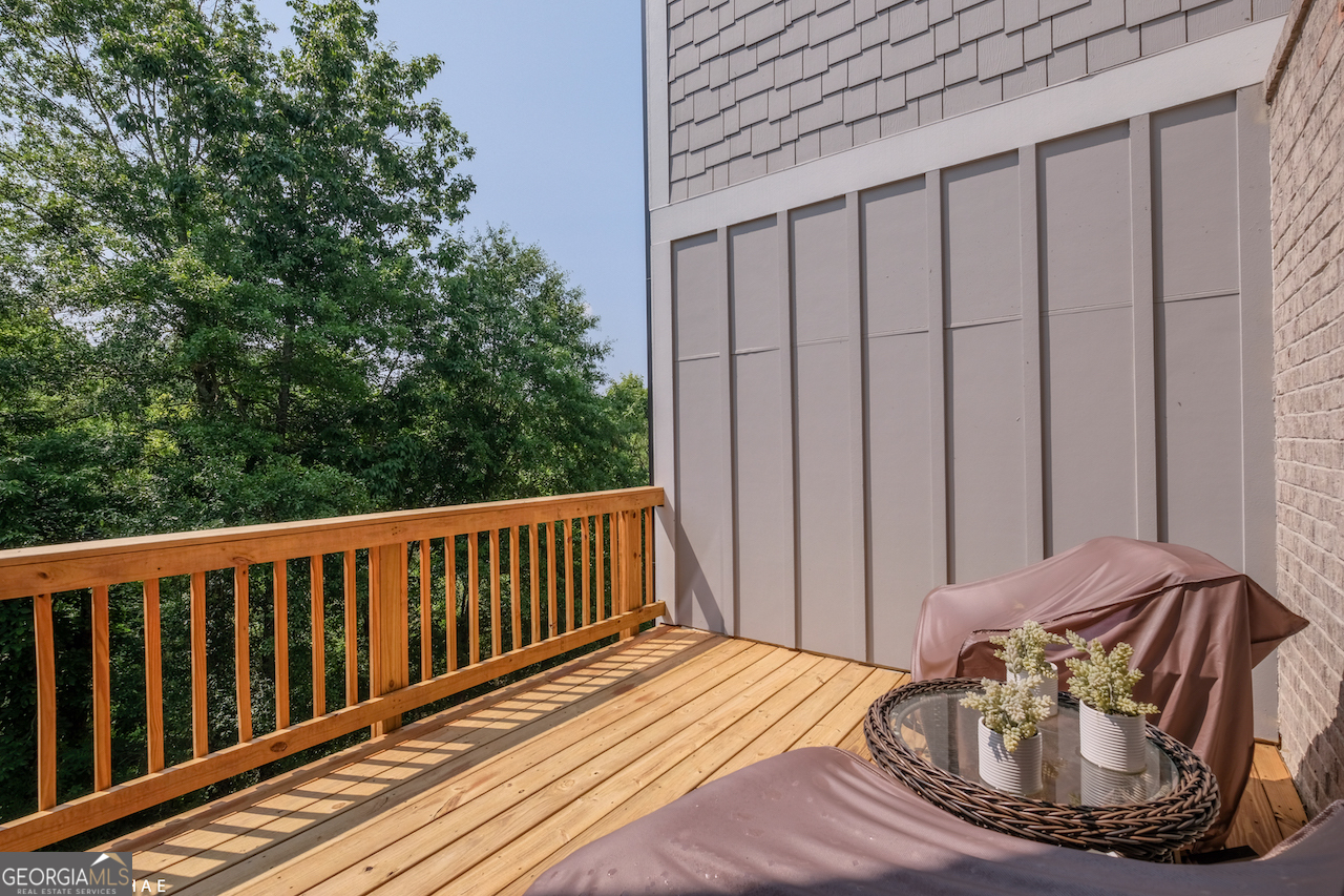 2247 Pink Hawthorn Drive Buford, GA 30518 - Photo 37 of 43 a view of a balcony with chair