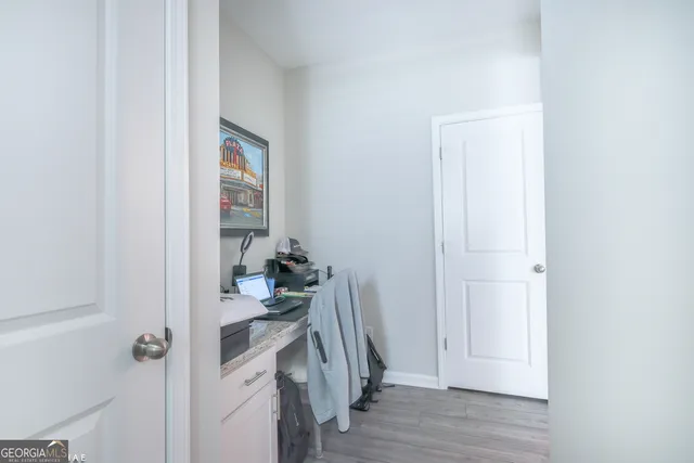 a view of a hallway with a closet