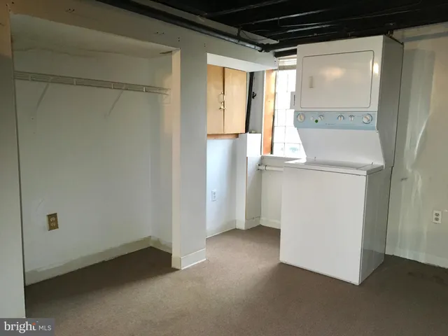 a view of walk in closet with window