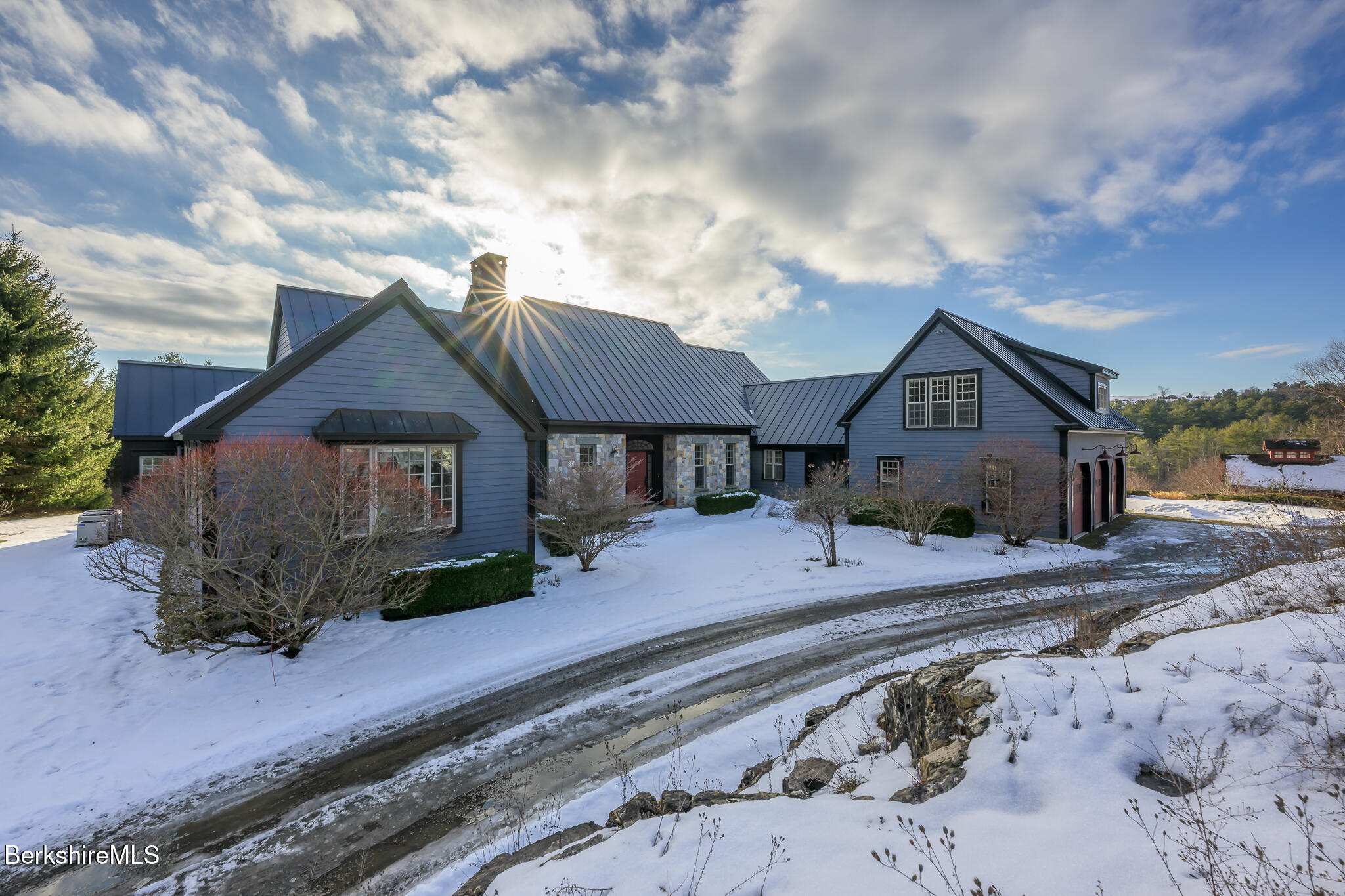 58 Round Hill Road Great Barrington, MA 01230 - Photo 1 of 79 a front view of a house with a yard