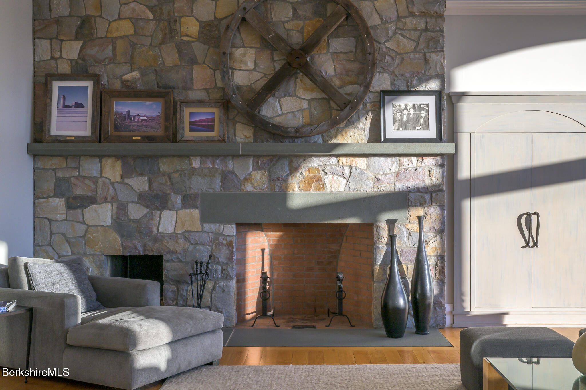 58 Round Hill Road Great Barrington, MA 01230 - Photo 12 of 79 a living room with furniture and a fireplace