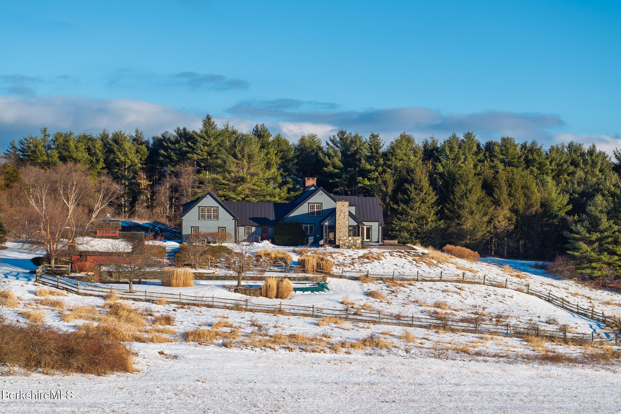 58 Round Hill Road Great Barrington, MA 01230 - Photo 3 of 79 a view of a house with a snow on the road