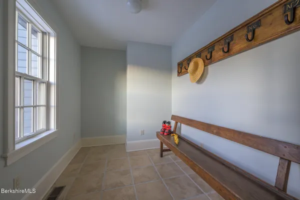 a spacious bedroom with a bed and a couch