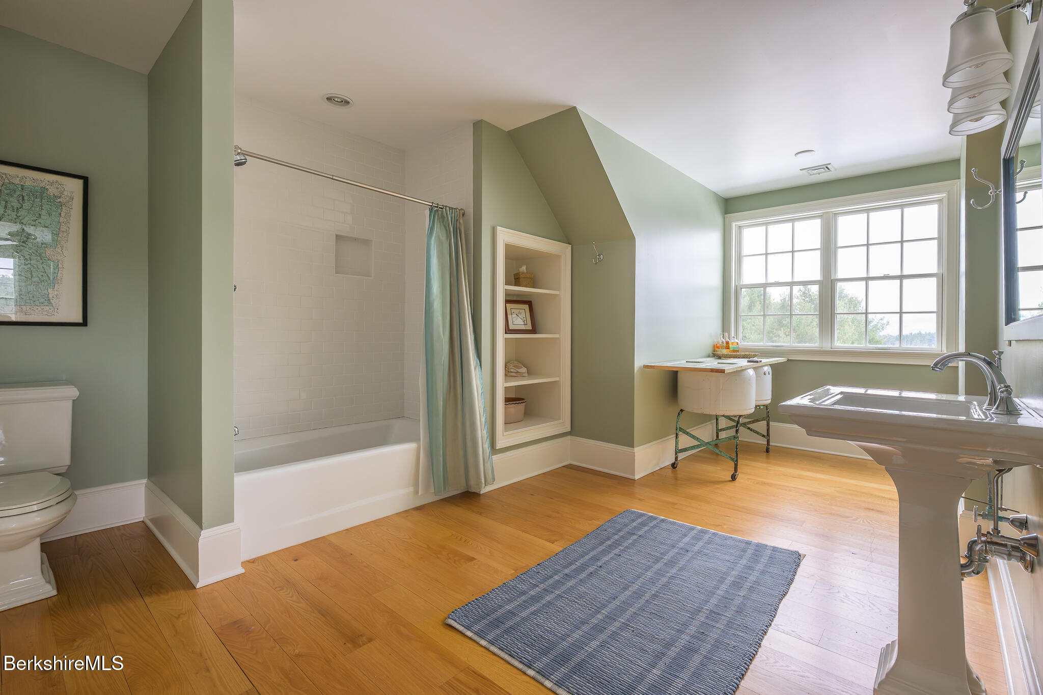 58 Round Hill Road Great Barrington, MA 01230 - Photo 48 of 79 a living room with a couch and a table