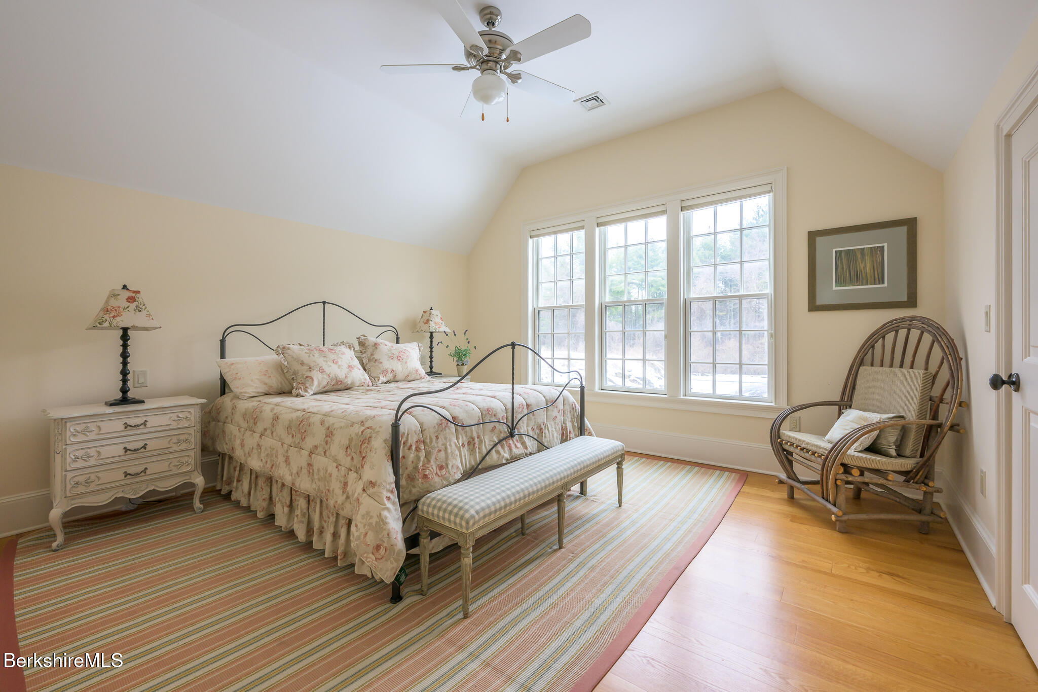 58 Round Hill Road Great Barrington, MA 01230 - Photo 51 of 79 a bedroom with a bed and wooden floor