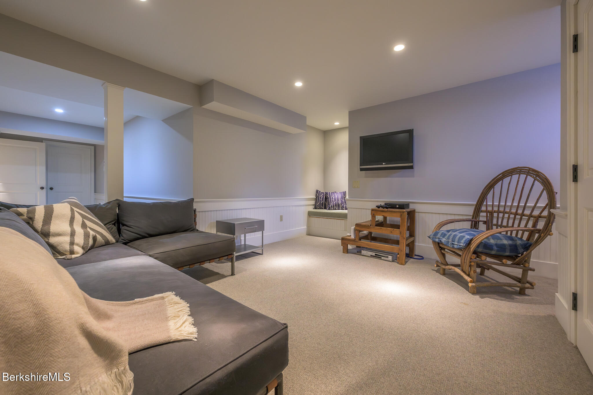 58 Round Hill Road Great Barrington, MA 01230 - Photo 53 of 79 a living room with furniture and a flat screen tv