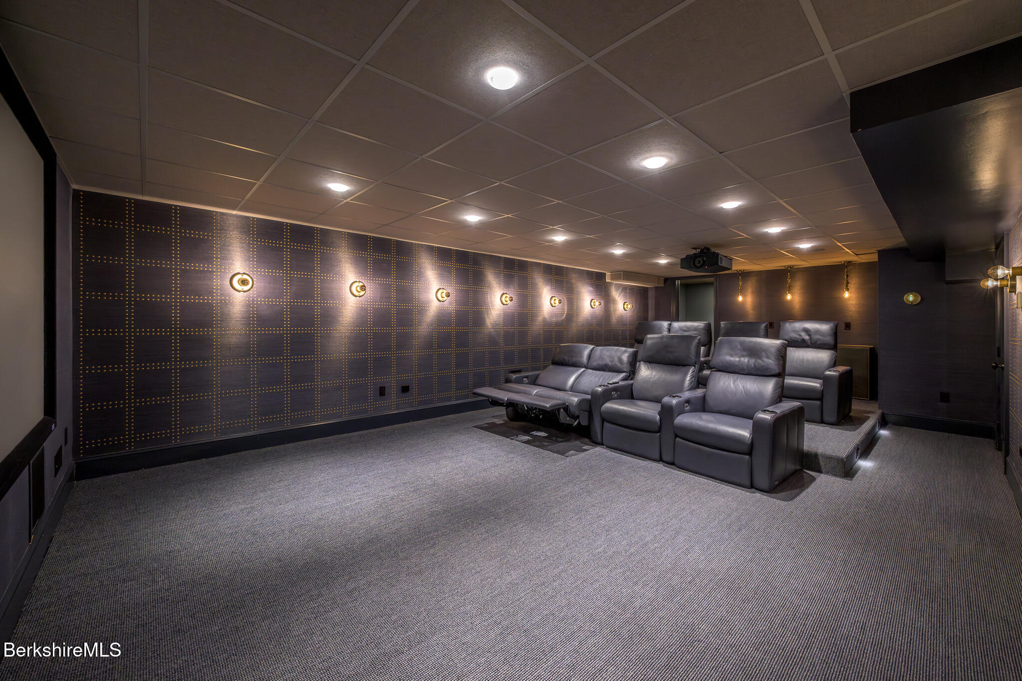 58 Round Hill Road Great Barrington, MA 01230 - Photo 55 of 79 a lobby with furniture and a projector