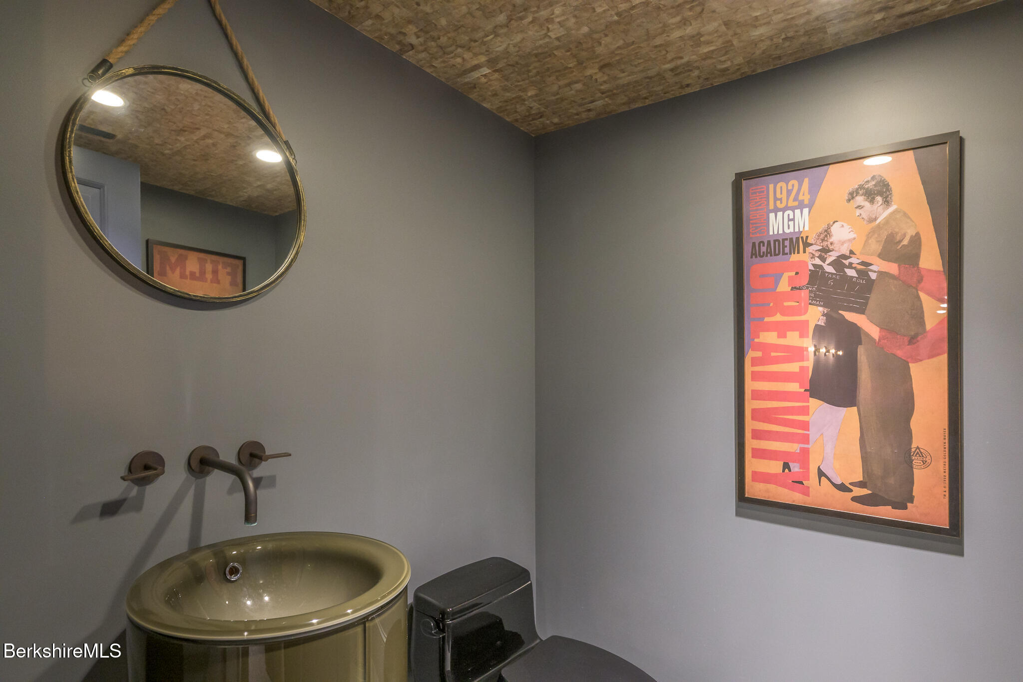 58 Round Hill Road Great Barrington, MA 01230 - Photo 57 of 79 a bathroom with a sink and a mirror