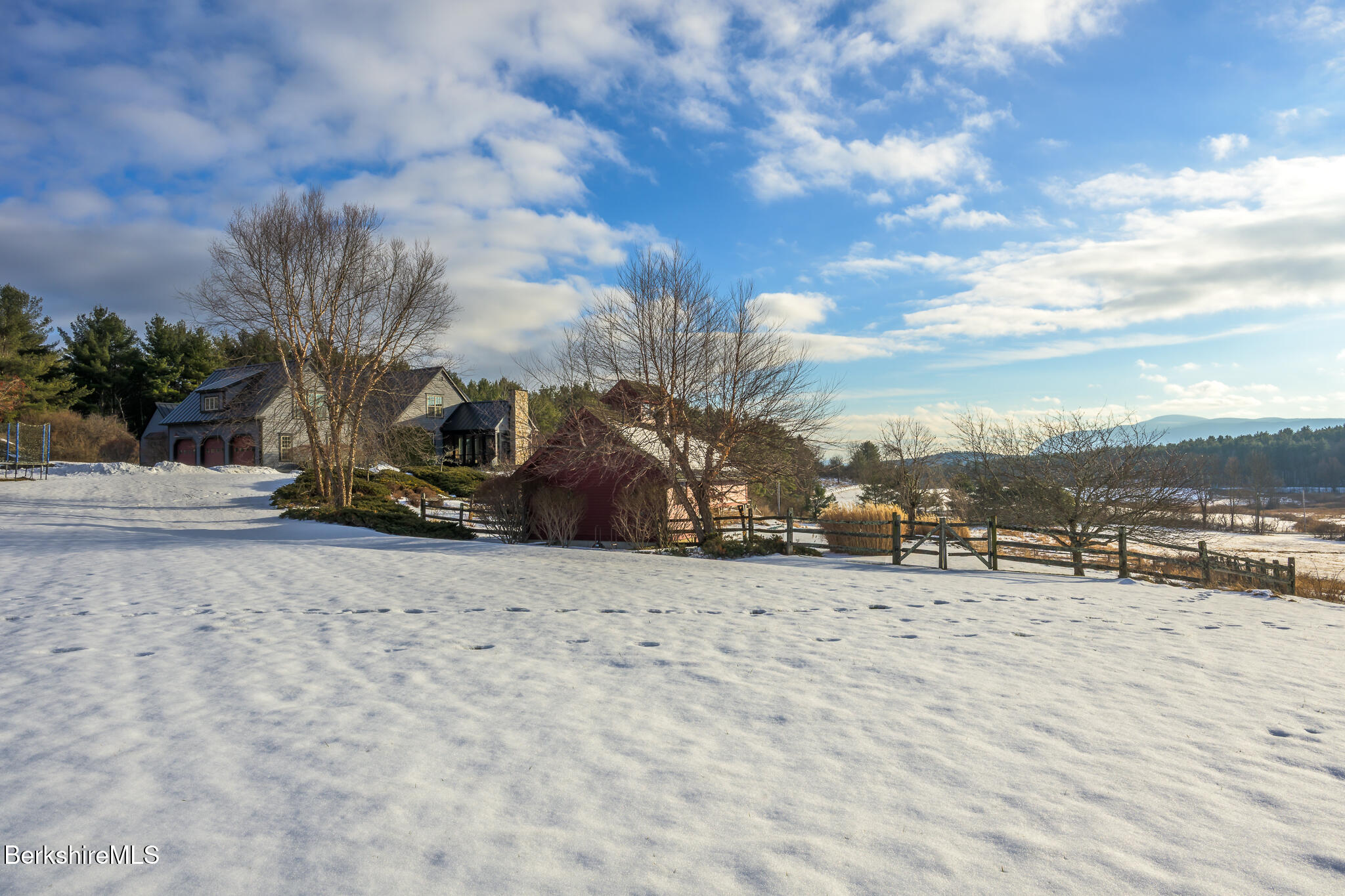 58 Round Hill Road Great Barrington, MA 01230 - Photo 76 of 79 a view of a road with a building in the background