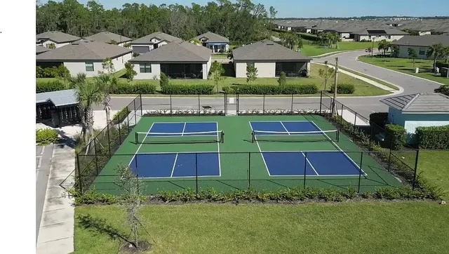 a aerial view of a house with a yard