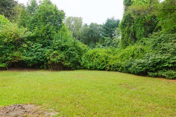 66 Eaton Road Framingham, MA 01701 - Photo 11 of 12 a view of a field with an outdoor space