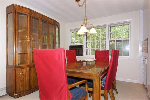 66 Eaton Road Framingham, MA 01701 - Photo 4 of 12 a view of a dining room with furniture window and outside view