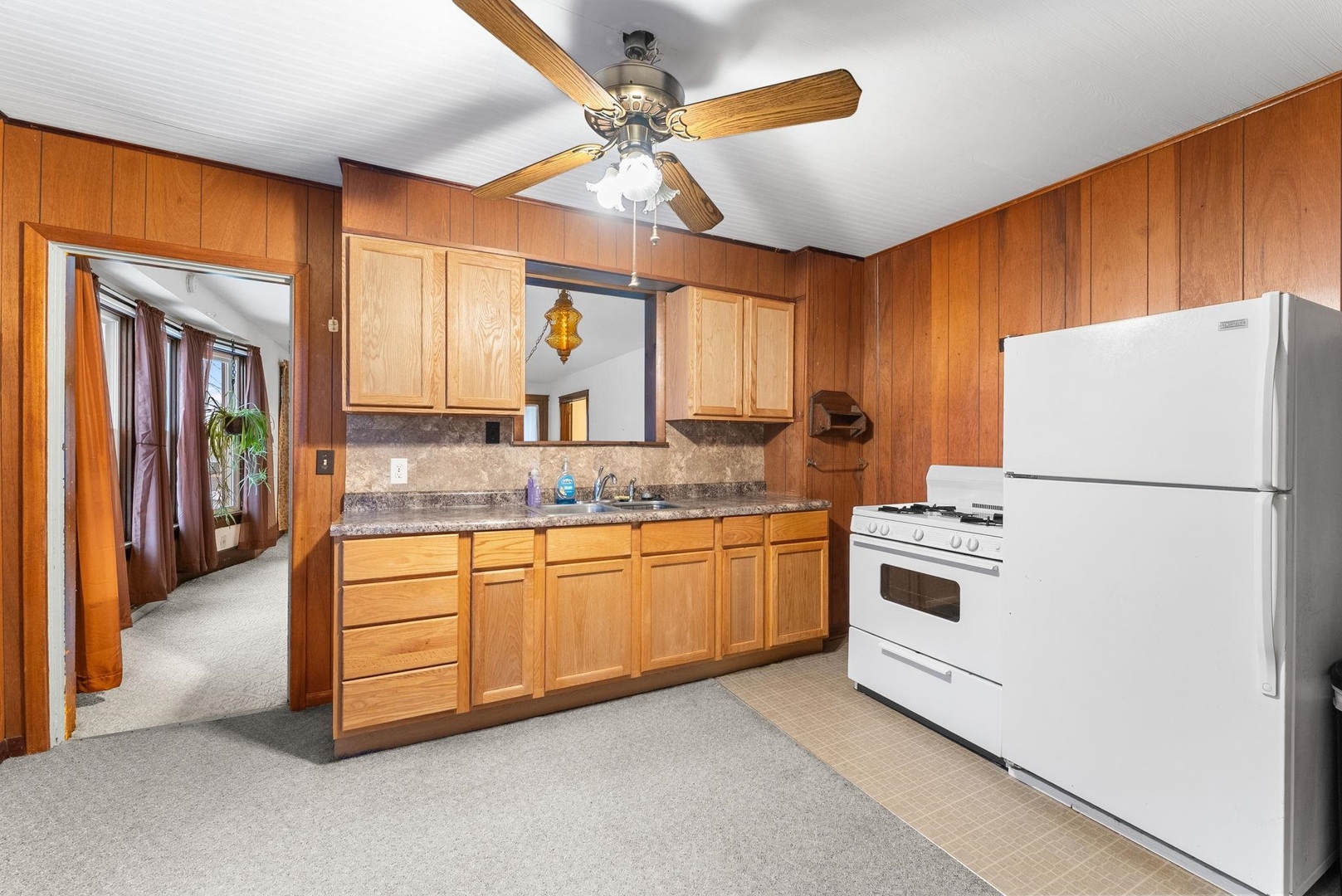 107 East Liberty Street Joy, IL 61260 - Photo 14 of 19 a kitchen with stainless steel appliances granite countertop a refrigerator a sink a stove and a refrigerator