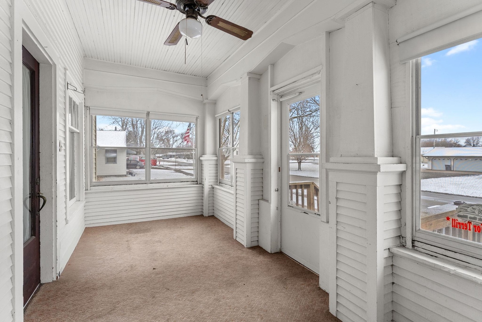 107 East Liberty Street Joy, IL 61260 - Photo 3 of 19 a view of a hallway with a cabinet and a window
