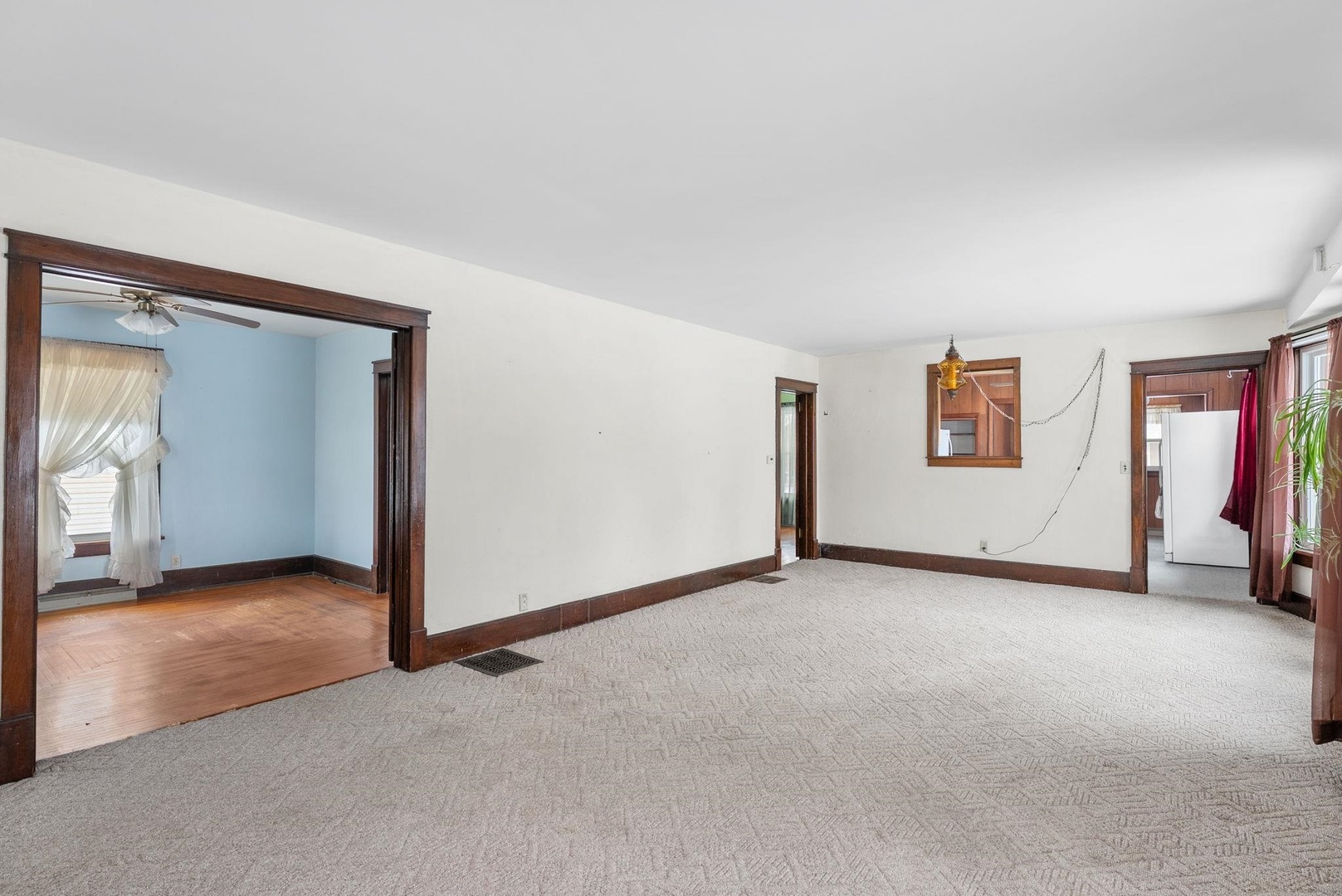 107 East Liberty Street Joy, IL 61260 - Photo 5 of 19 an empty room with windows and closet