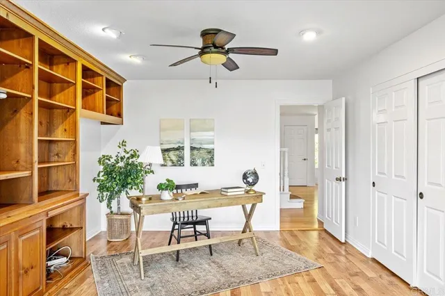 a bathroom with a shower and a mirror
