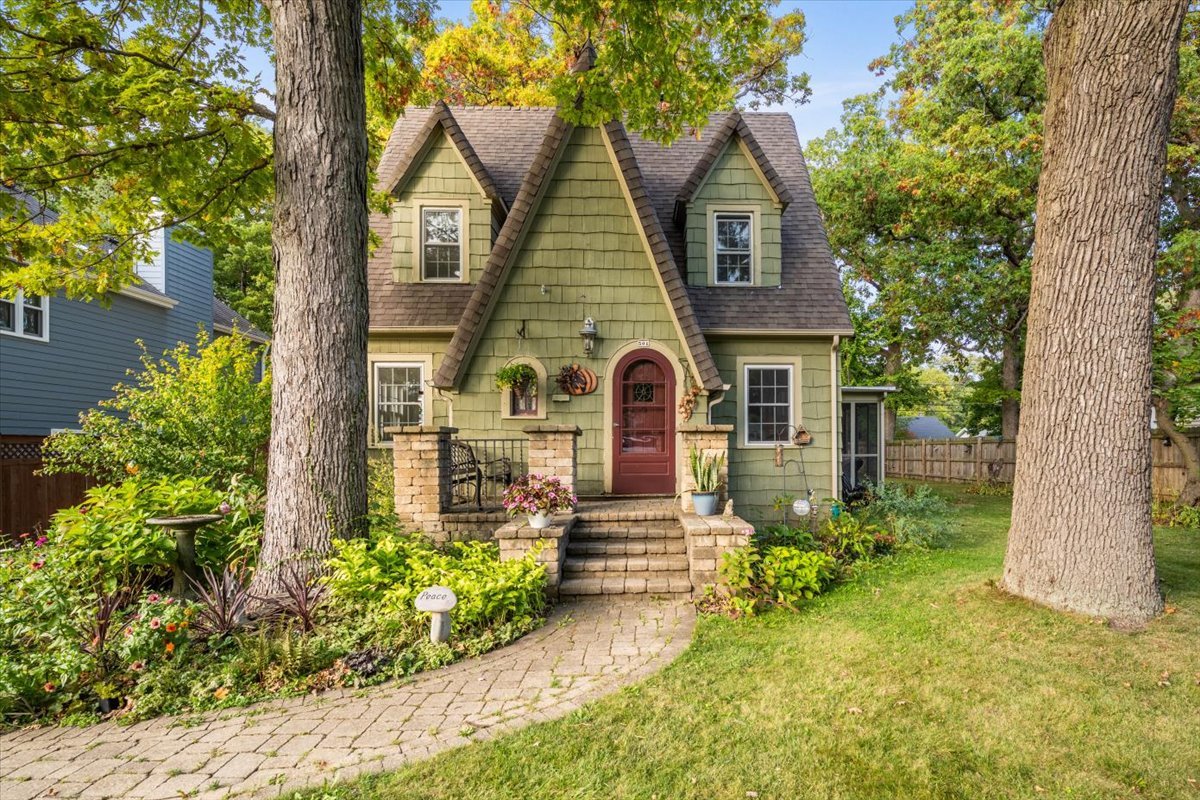 front view of a house with a yard