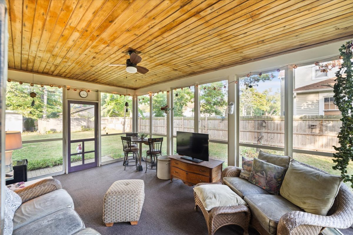 501 Dodson Street Geneva, IL 60134 - Photo 11 of 23 a living room with furniture and a flat screen tv