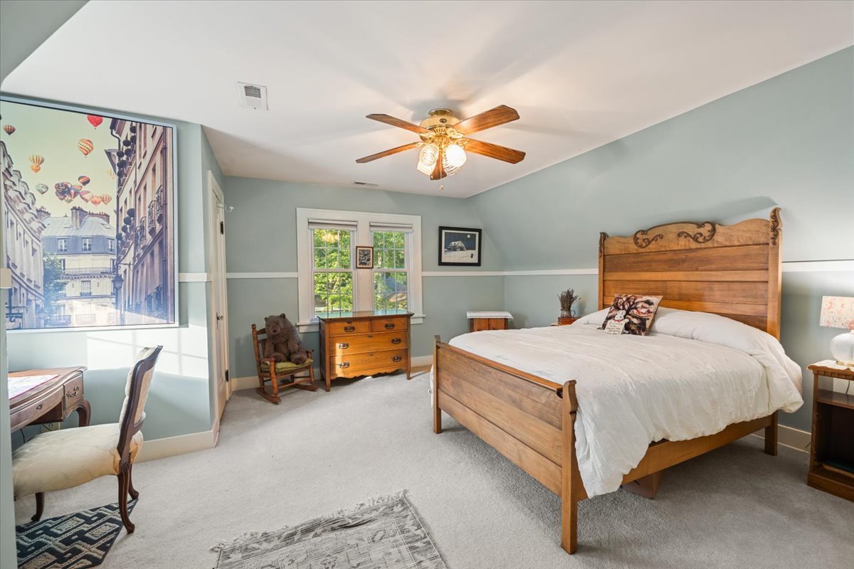 501 Dodson Street Geneva, IL 60134 - Photo 16 of 23 a bedroom with a bed and furniture