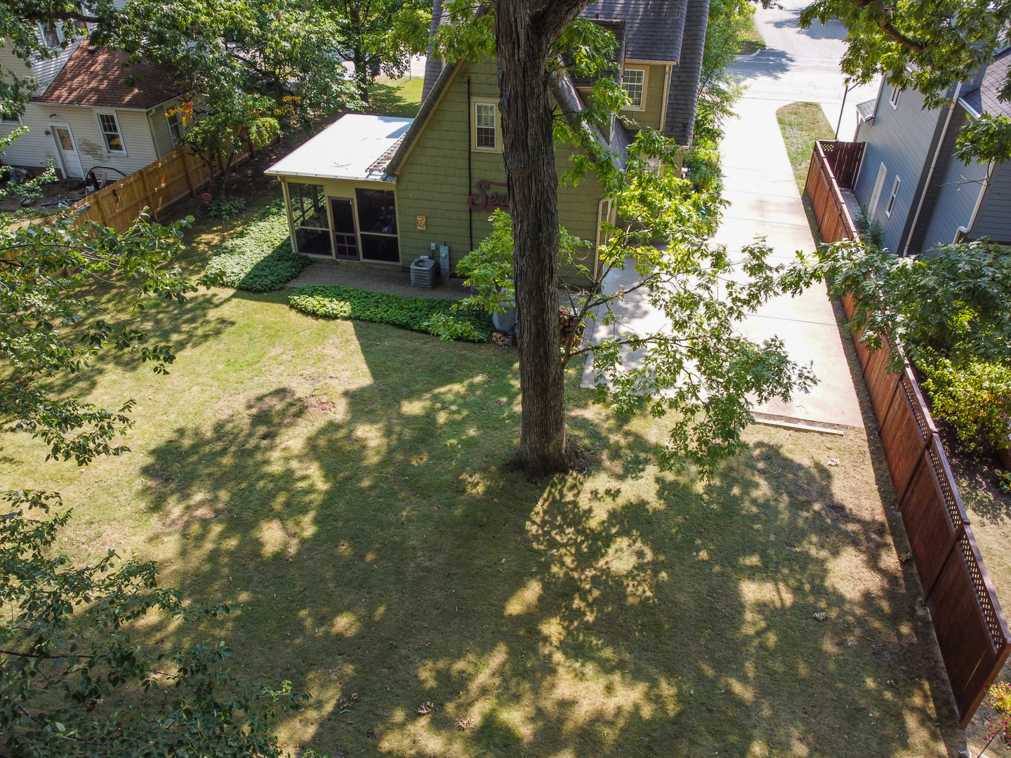 501 Dodson Street Geneva, IL 60134 - Photo 17 of 23 a front view of a house with garden